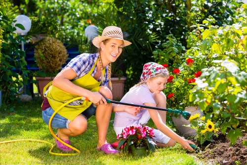 Seasonal garden maintenance work in Dartmouth Park with weeding and border care
